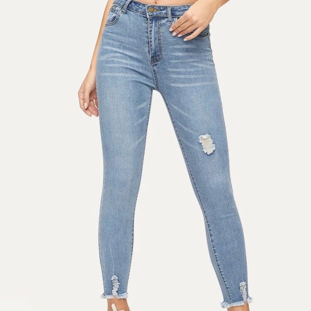 Distressed ankle jeans